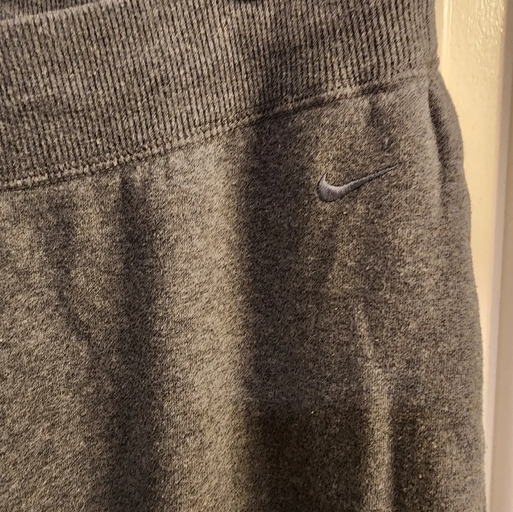 Nike sweatpants size LG dark gray
